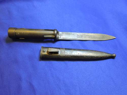 Military bayonet with Scabbard for R1 rifle.